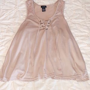 TAN TANK LACE AND CRISS CROSS DETAIL!